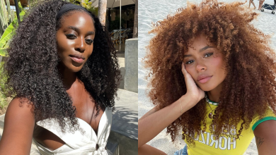 Two women with curly hair.
