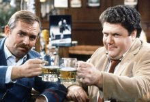 Cheers, from left, John Ratzenberger, George Wendt, 1982-93.