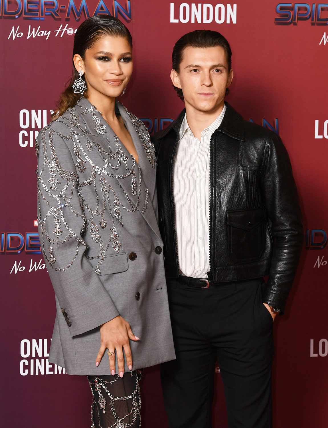 Zendaya and Tom Holland attend a photocall for "Spiderman: No Way Home" at The Old Sessions House