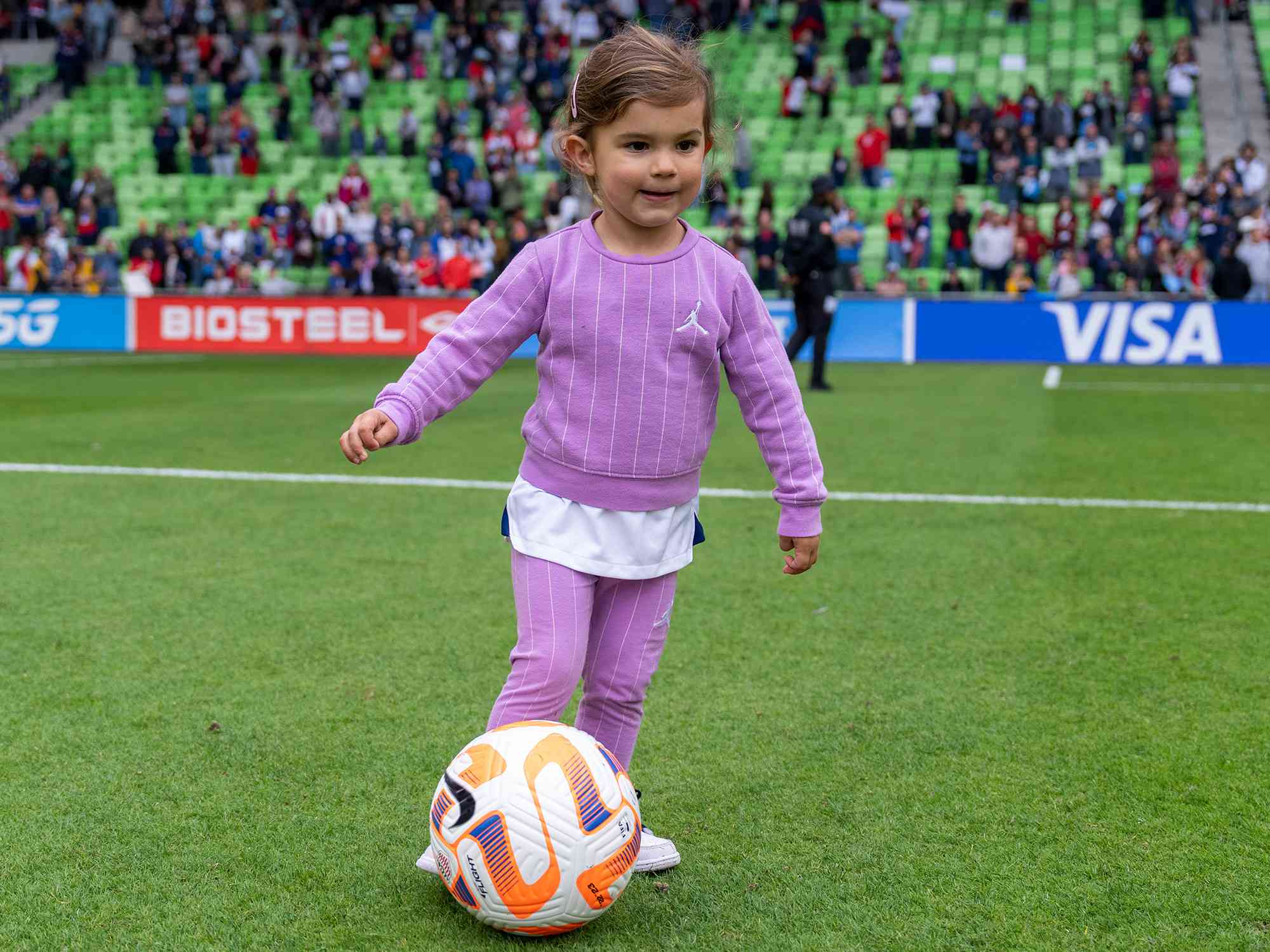 Alex Morgan #13 of the United States watches her daughter Charlie Carrasco dribble during an international friendly game between Ireland and USWNT