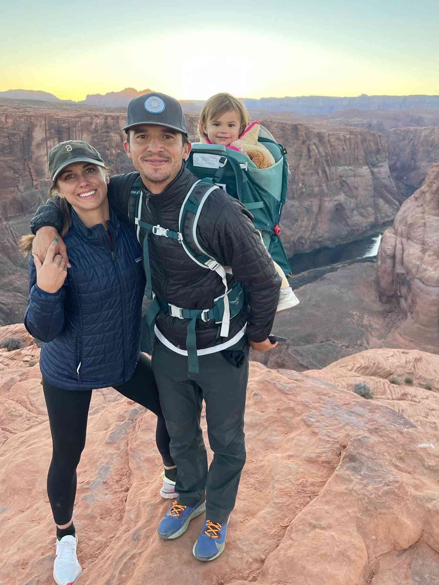 Alex Morgan and Servando Carrasco with their daughter, Charlie