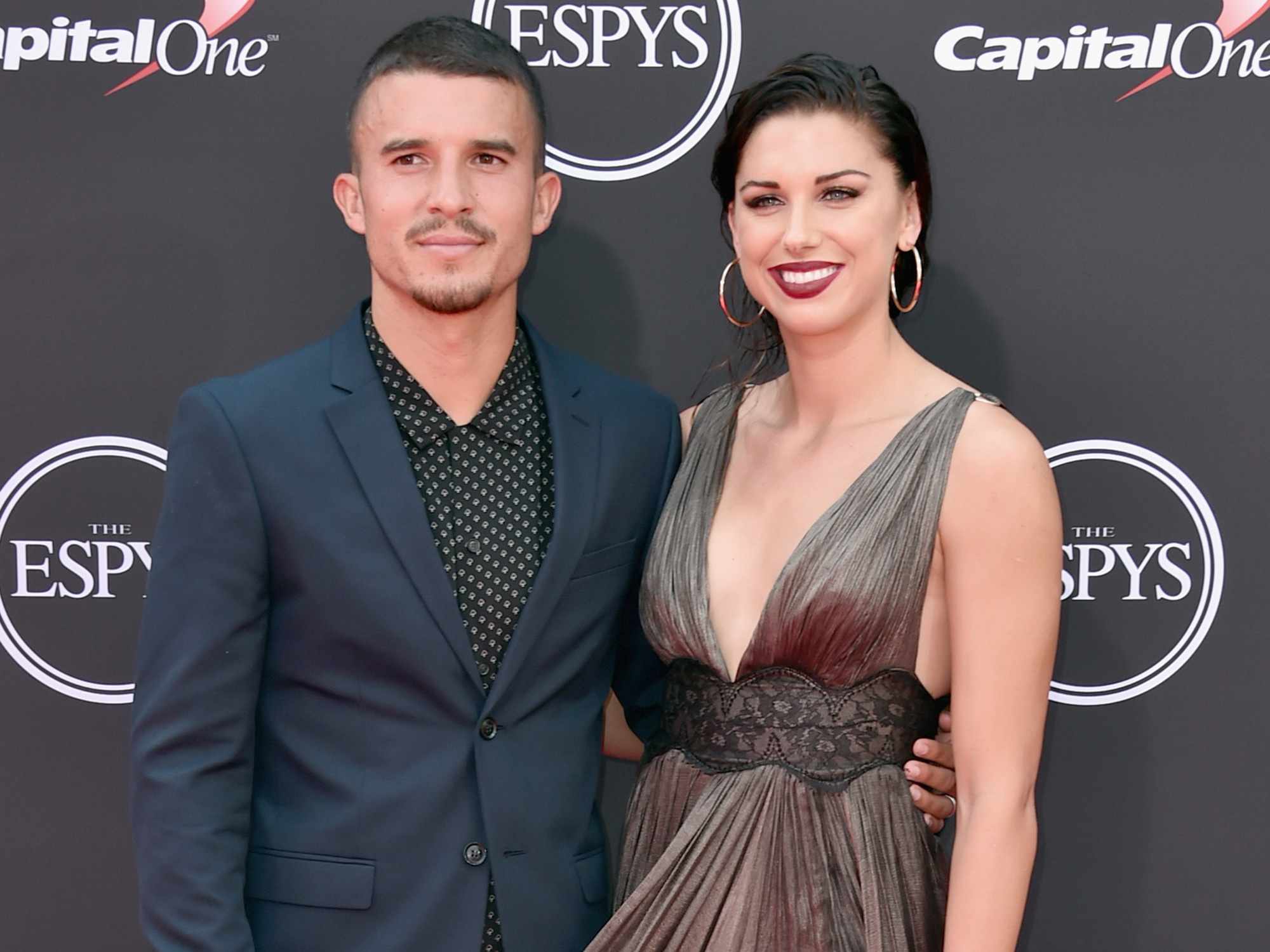 Servando Carrasco (L) and wfie Alex Morgan attend The 2018 ESPYS