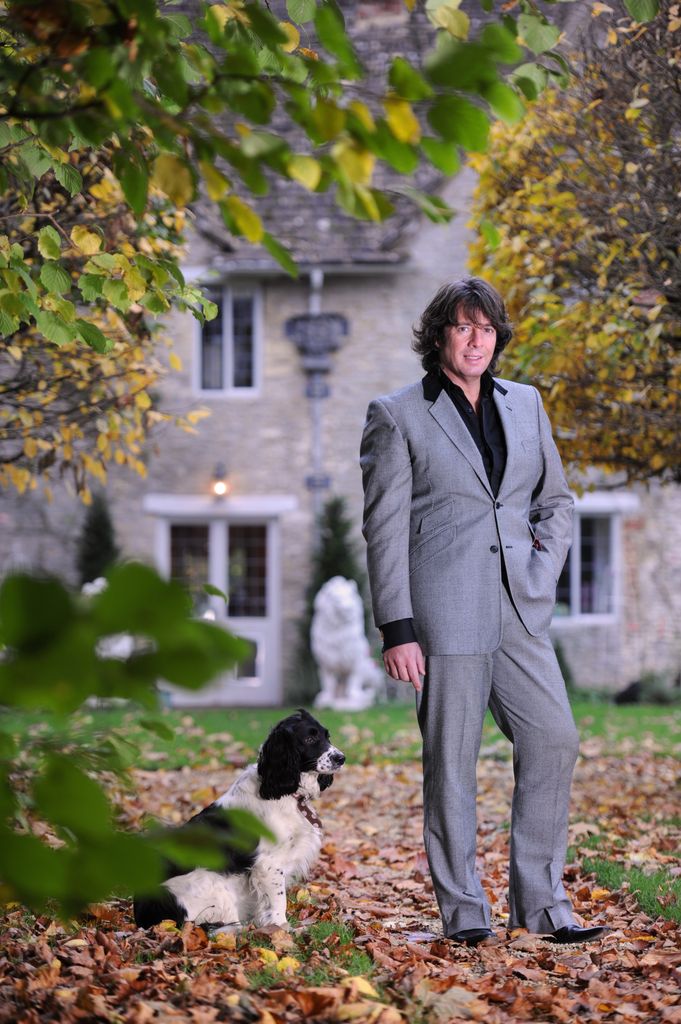 Laurence Llewelyn-Bowen at his home with his dog