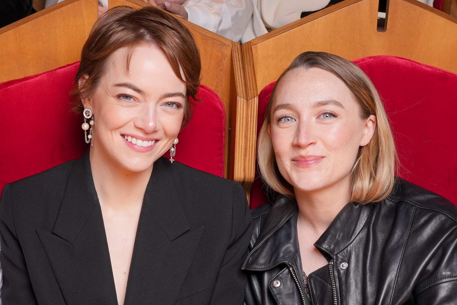 Emma Stone and Saoirse Ronan at the Louis Vuitton Cruise 2026 show held at the Palais des Papes