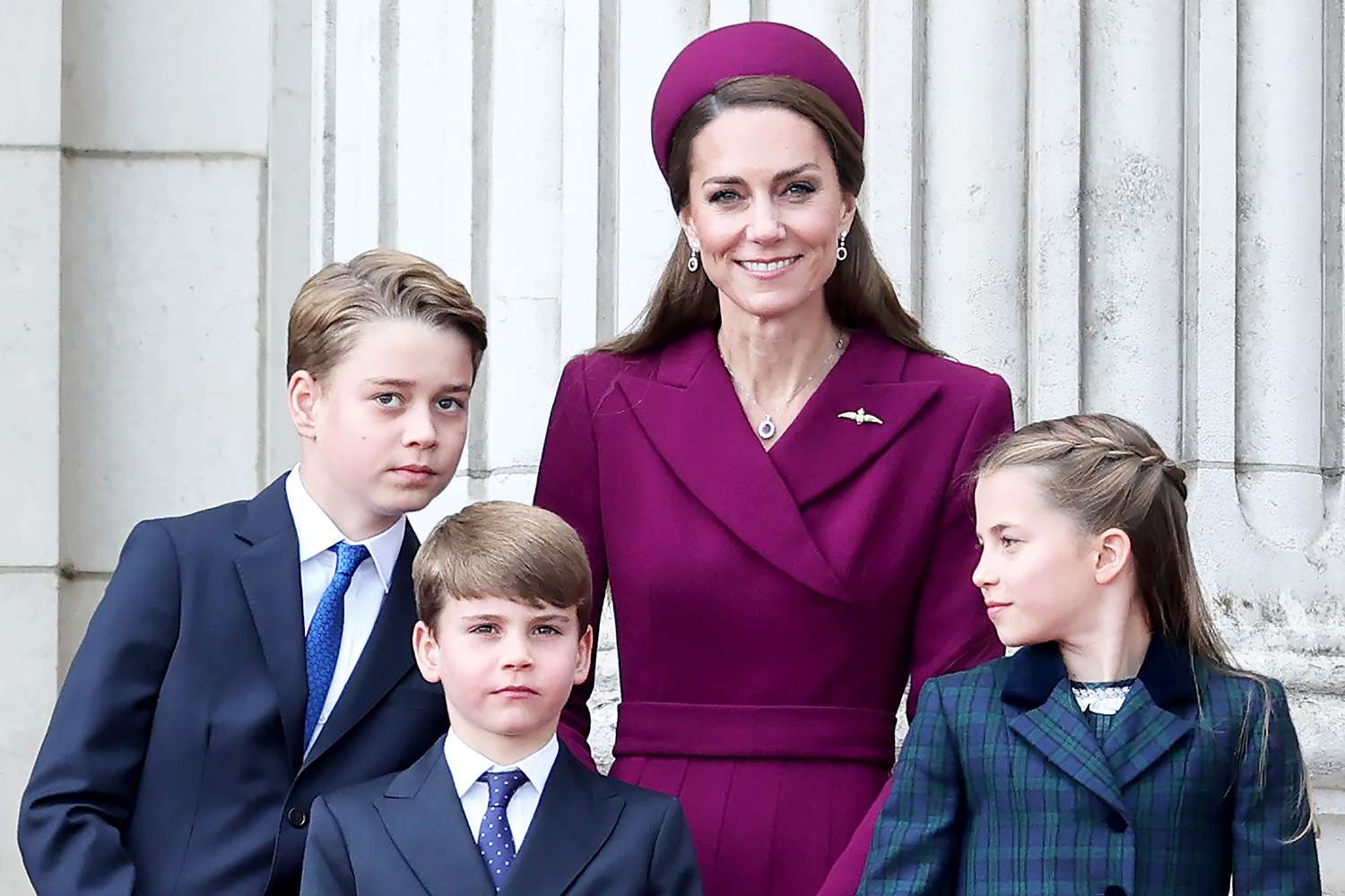 Prince George of Wales, Prince Louis of Wales, Catherine, Princess of Wales and Princess Charlotte of Wales watch the fly-past on the balcony of Buckingham Palace whilst watching a fly-past during the military procession to mark the 80th anniversary of VE Day on May 05, 2025 in London, England