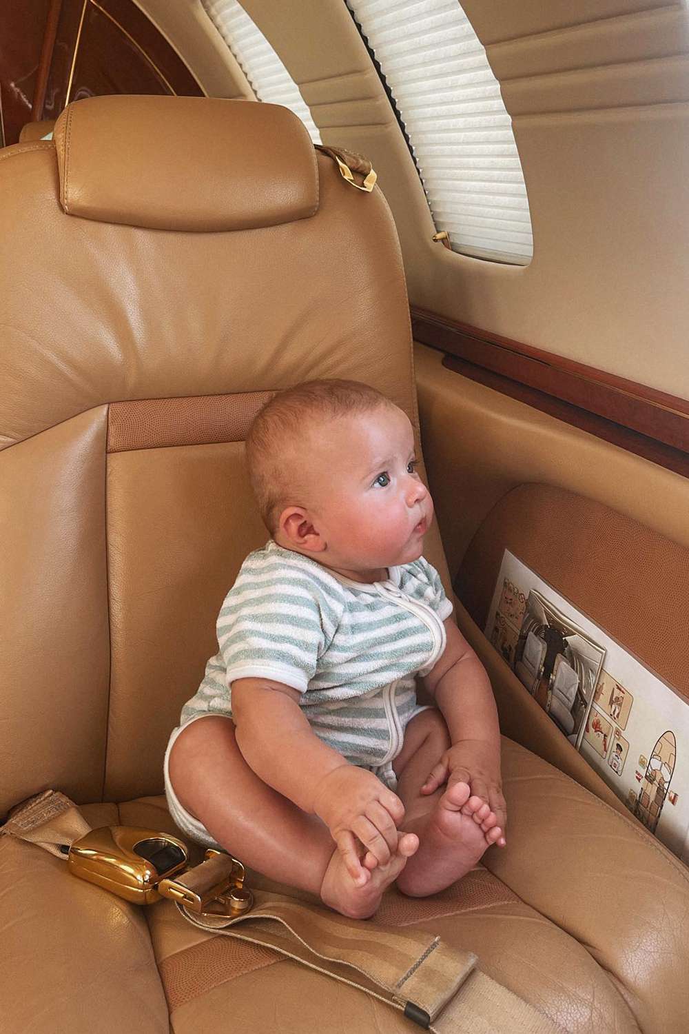 Molly-Mae Hague's daughter Bambi sits in a private jet in July 2023.