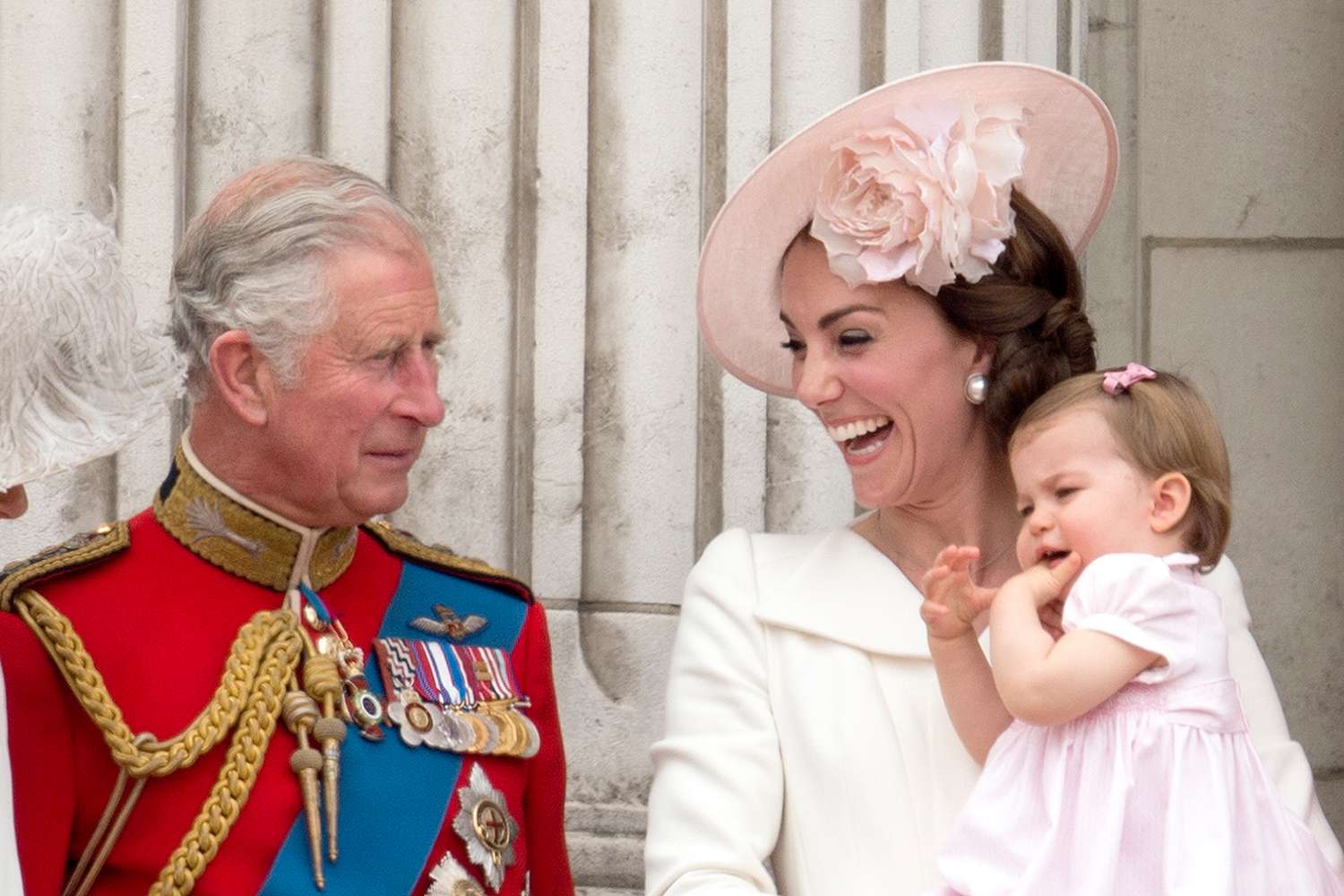 Prince Charles, Prince of Wales with Catherine, Duchess of Cambridge and Princess Charlotte of Cambridge during the Trooping the Colour, this year marking the Queen's 90th birthday at The Mall on June 11, 2016 in London, England.