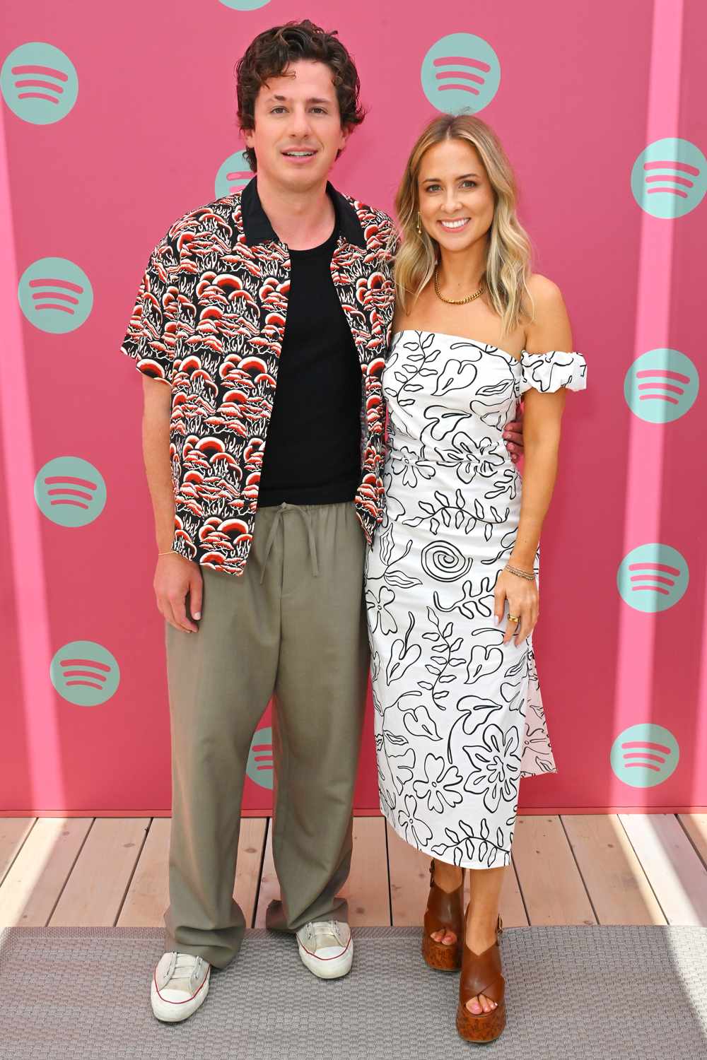 Charlie Puth (L), GRAMMY-Nominated, Multi-Platinum Singer, Songwriter, and Producer poses with Spotify's Bridget 