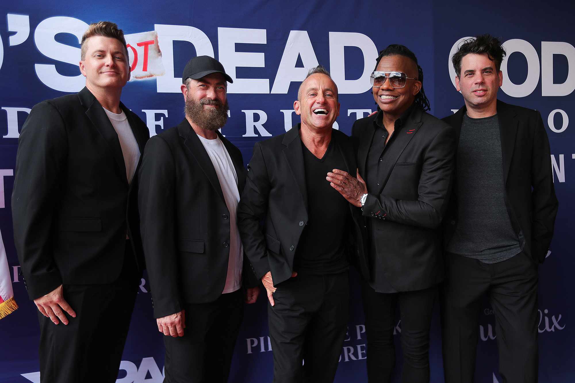 SOUTHLAKE, TEXAS - SEPTEMBER 4: (L-R) Duncan Phillips, Jody Davis, Peter Furler, Michael Tait and Jeff Frankenstein of Newsboys band attend the red carpet during the "God's Not Dead: In God We Trust" premiere at EVO Entertainment Southlake on September 4, 2024 in Southlake, Texas.