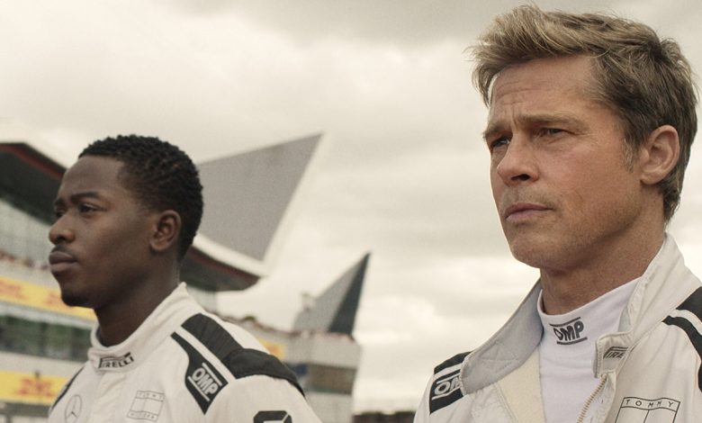 Damson Idris as Joshua Pearce and Brad Pitt as Sonny Hayes in F1