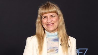 Catherine Hardwicke attends the premiere of Emilia Perez in a white blazer and multi-colored turtleneck.