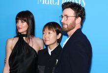 NEW YORK, NEW YORK - JUNE 07: (L-R) Dakota Johnson, Celine Song and Chris Evans attend A24