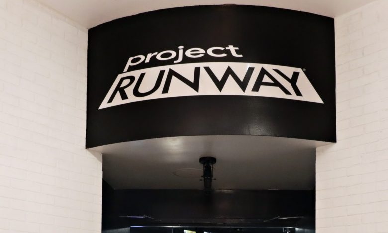 Project Runway branding logo seen above a doorway