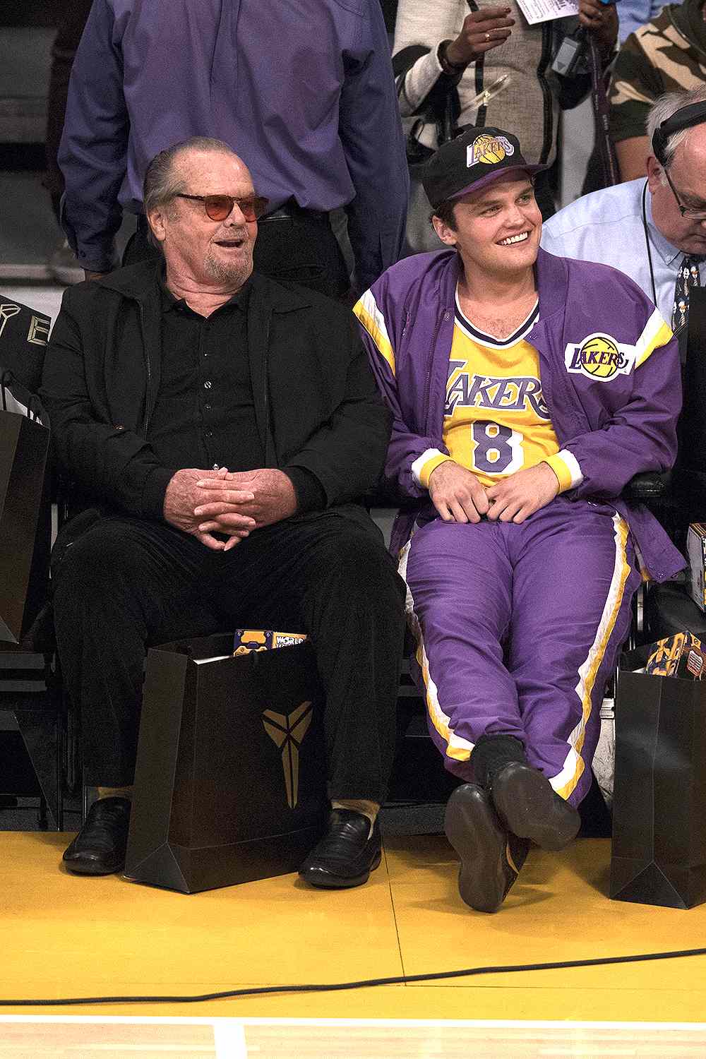 Los Angeles Lakers fan and actor Jack Nicholson with son Raymond sitting courtside during game vs Utah Jazz at Staples Center. Final game of Kobe Bryant's career.