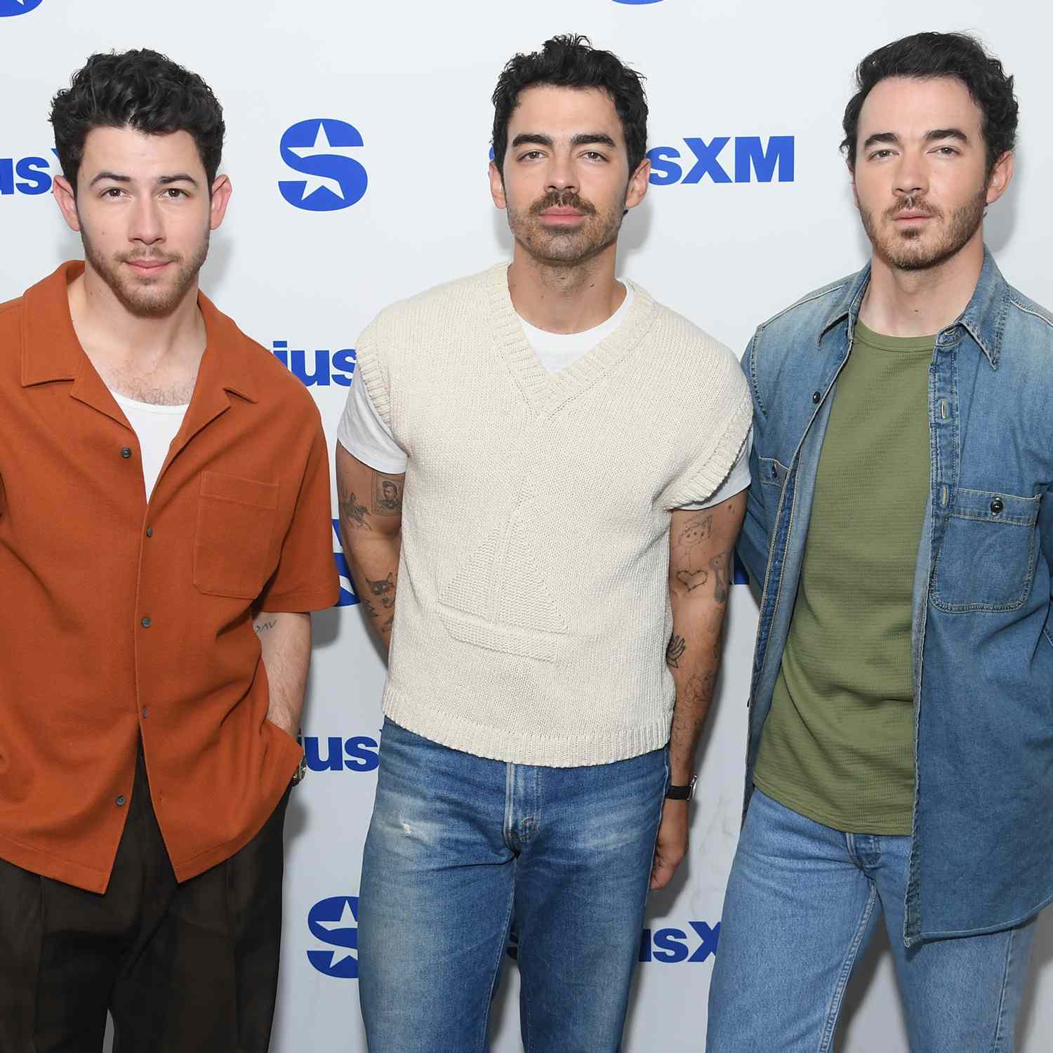 Nick Jonas, Joe Jonas and Kevin Jonas of the band Jonas Brothers visit SiriusXM Studios on June 18, 