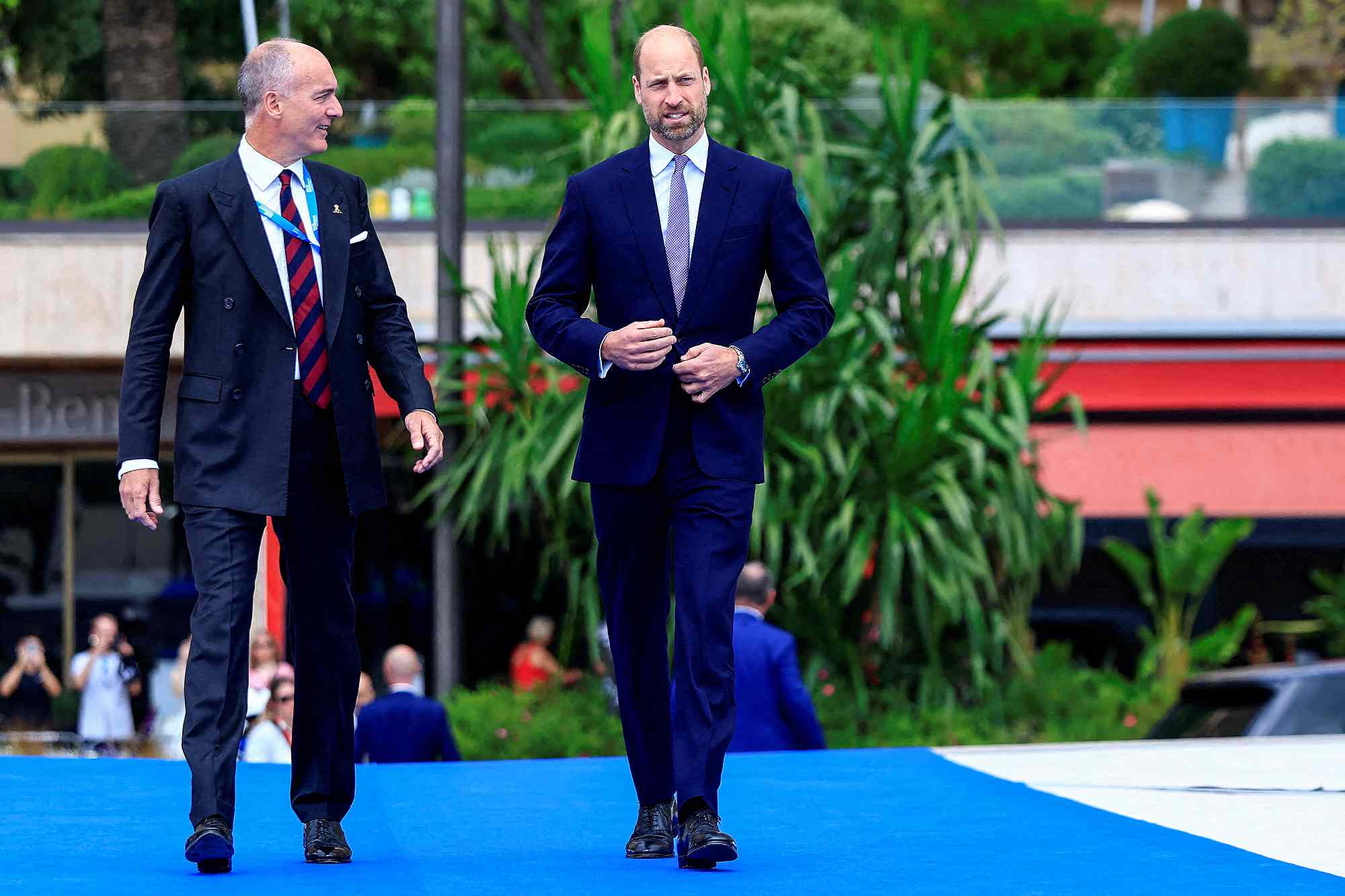 Britain's Prince William, Prince of Wales (R) talks to an official as he arrives at the Blue Economy and Finance Forum (BEFF) at The Grimaldi Forum in Monaco on June 8, 2025. World leaders have descended on the French Riviera ahead of a high-level summit to tackle a deepening crisis in the oceans driven by overfishing, climate change and pollution. The United Nations says oceans face an "emergency" and leaders gathering in Nice will be under pressure to commit much-needed money and stronger protections for the ailing seas and the people that depend on them.