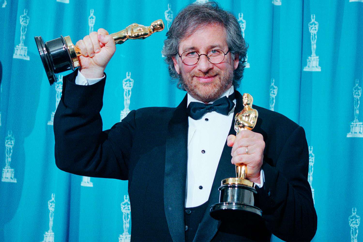 Steven Spielberg holds his two Oscars at the 66th annual Academy Awards at the Dorothy Chandler Pavilion in L.A. on March 21, 1994