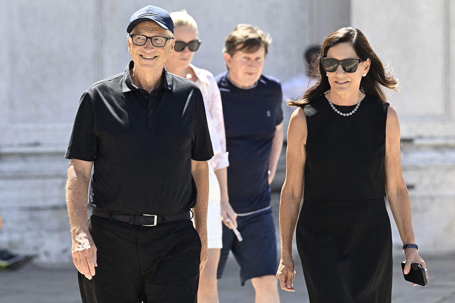  Bill Gates and partner Paula Hurd leave after a visit at the Gallerie dell'Accademia di Venezia, ahead of US Amazon founder Jeff Bezos' wedding with Lauren Sanchez, on June 27, 2025