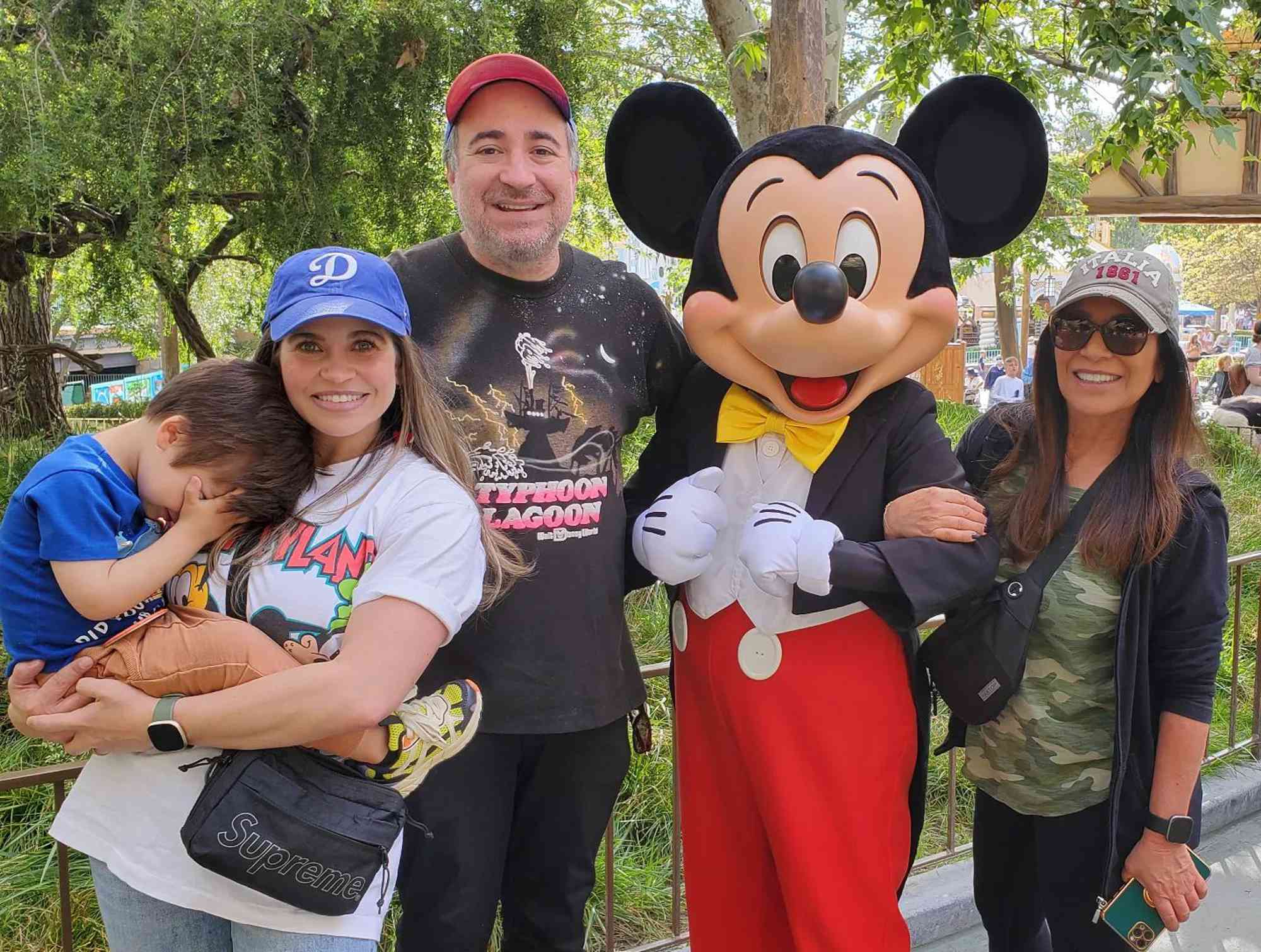 Danielle Fishel with her son Adler, Jensen Karp, Mickey Mouse, and her mom Jen FIshel.