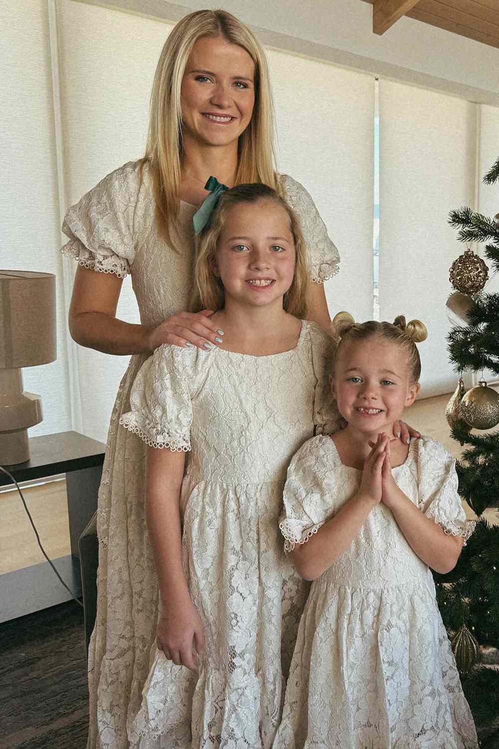 Elizabeth Smart and her two daughters Chloe and Olivia pose for a photo together in December 2025.