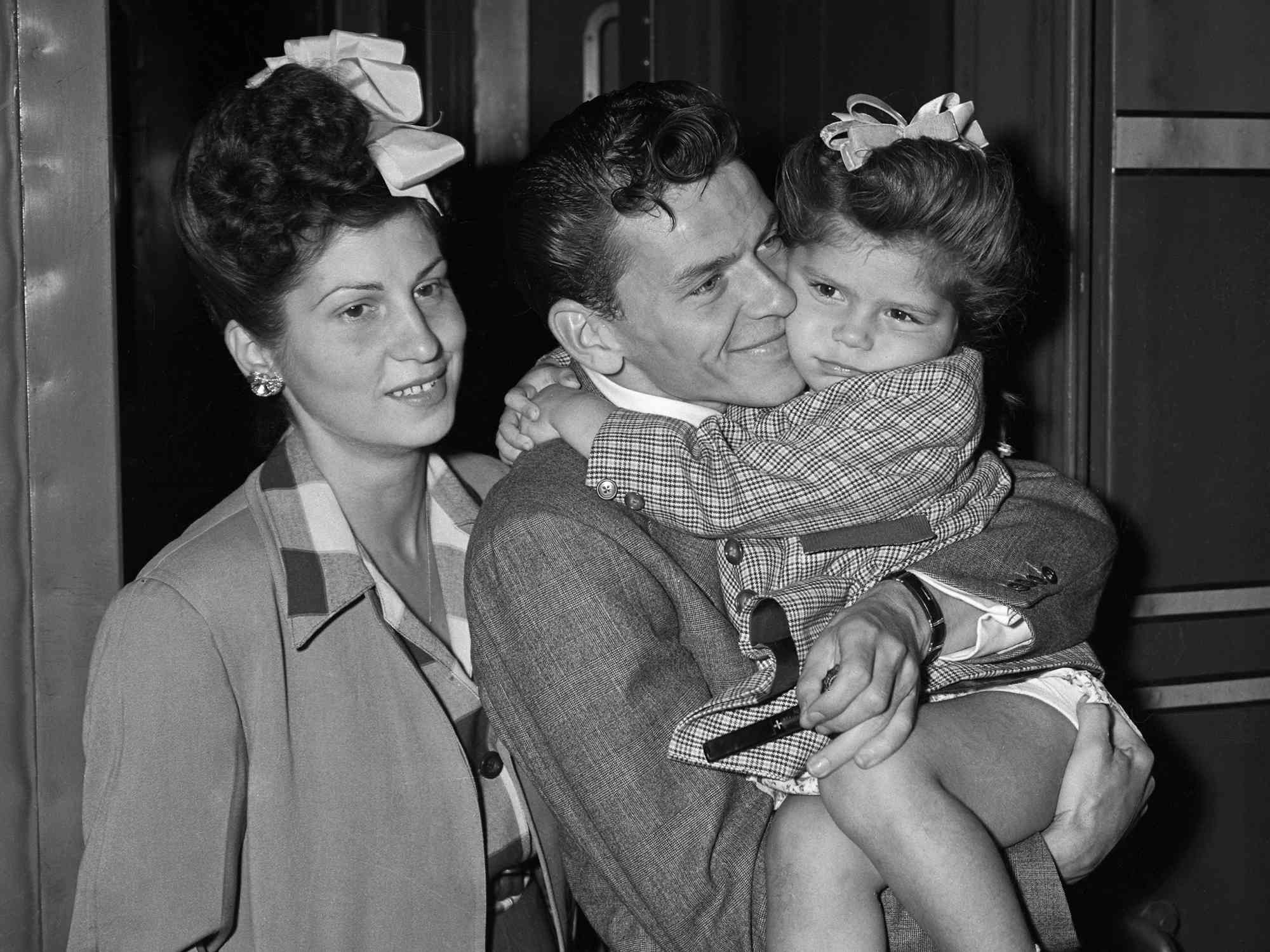 Nancy Barbato, Frank Sinatra, and Nancy Sinatra at Grand Central Station in New York City.