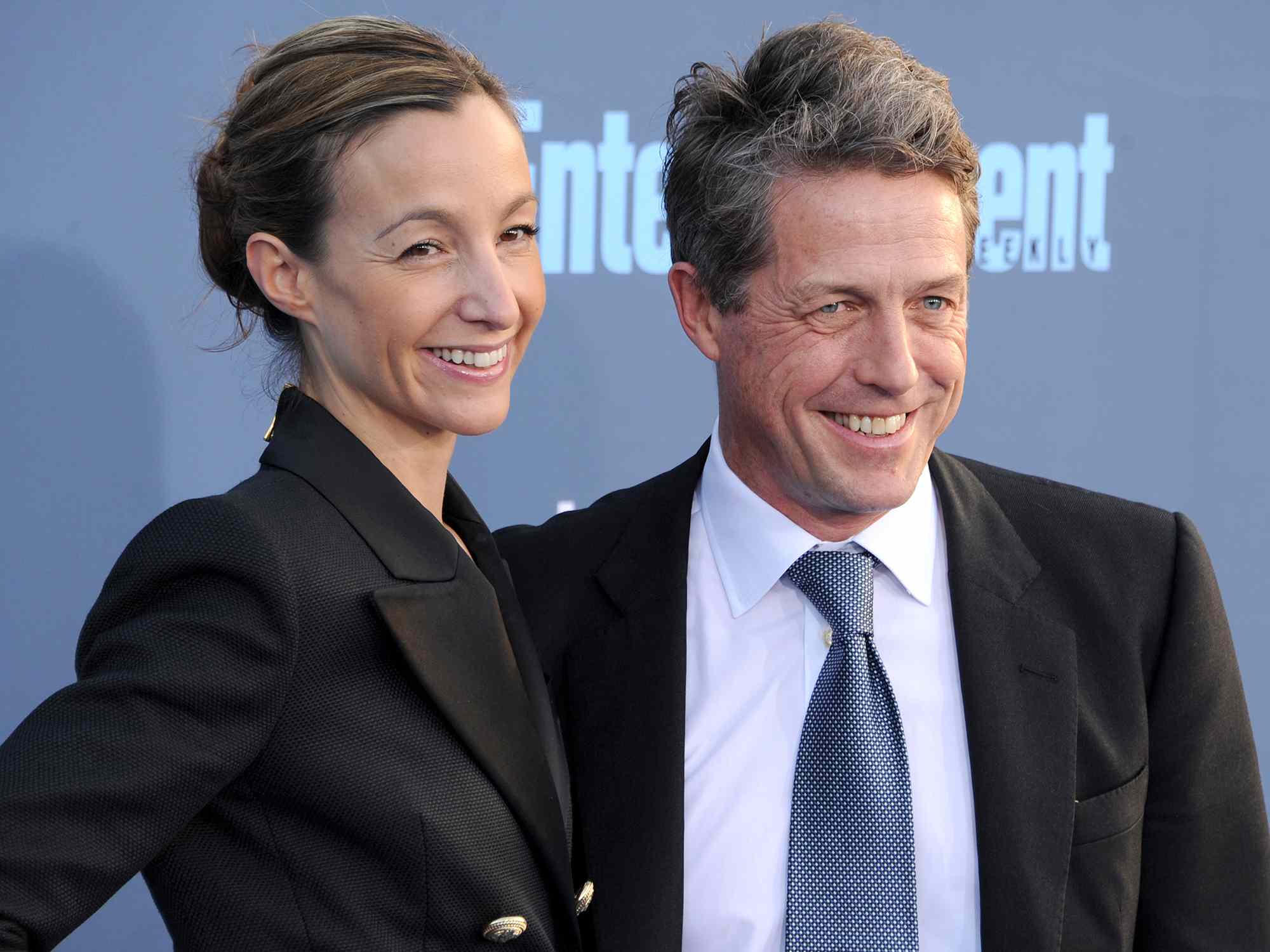 Hugh Grant and Anna Elisabet Eberstein arrive at The 22nd Annual Critics' Choice Awards at Barker Hangar on December 11, 2016 in Santa Monica, California