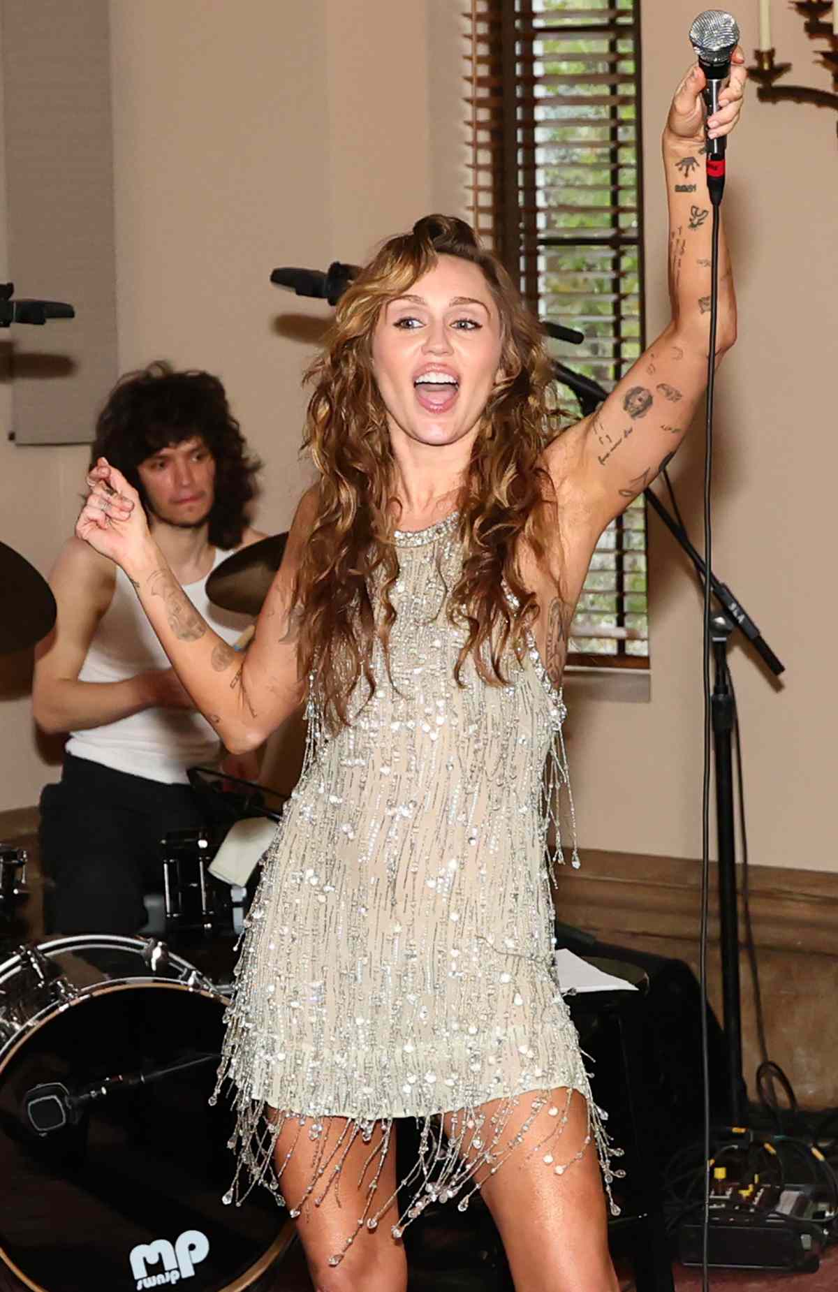 Miley Cyrus performs onstage during TikTok Presents Something Beautiful Album Release Event