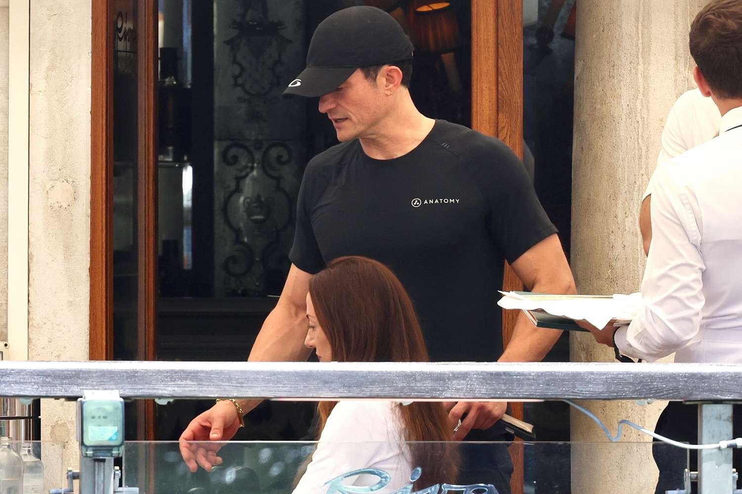 Orlando Bloom and friends are seen enjoying a lunch together at Riva Lounge in Venice