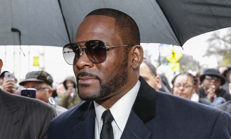 R. Kelly wearing glasses
