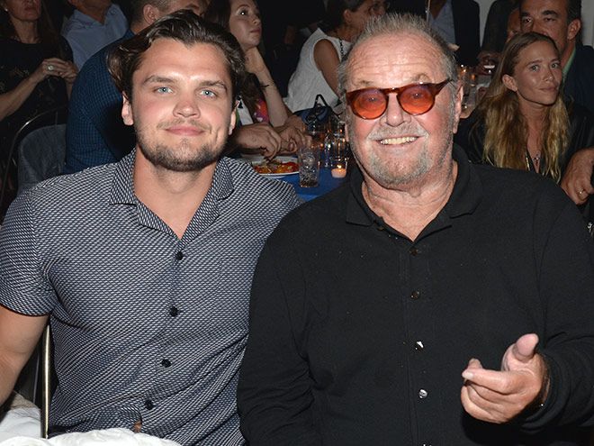 Ray Nicholson and Jack Nicholson pose for a photo while sitting down