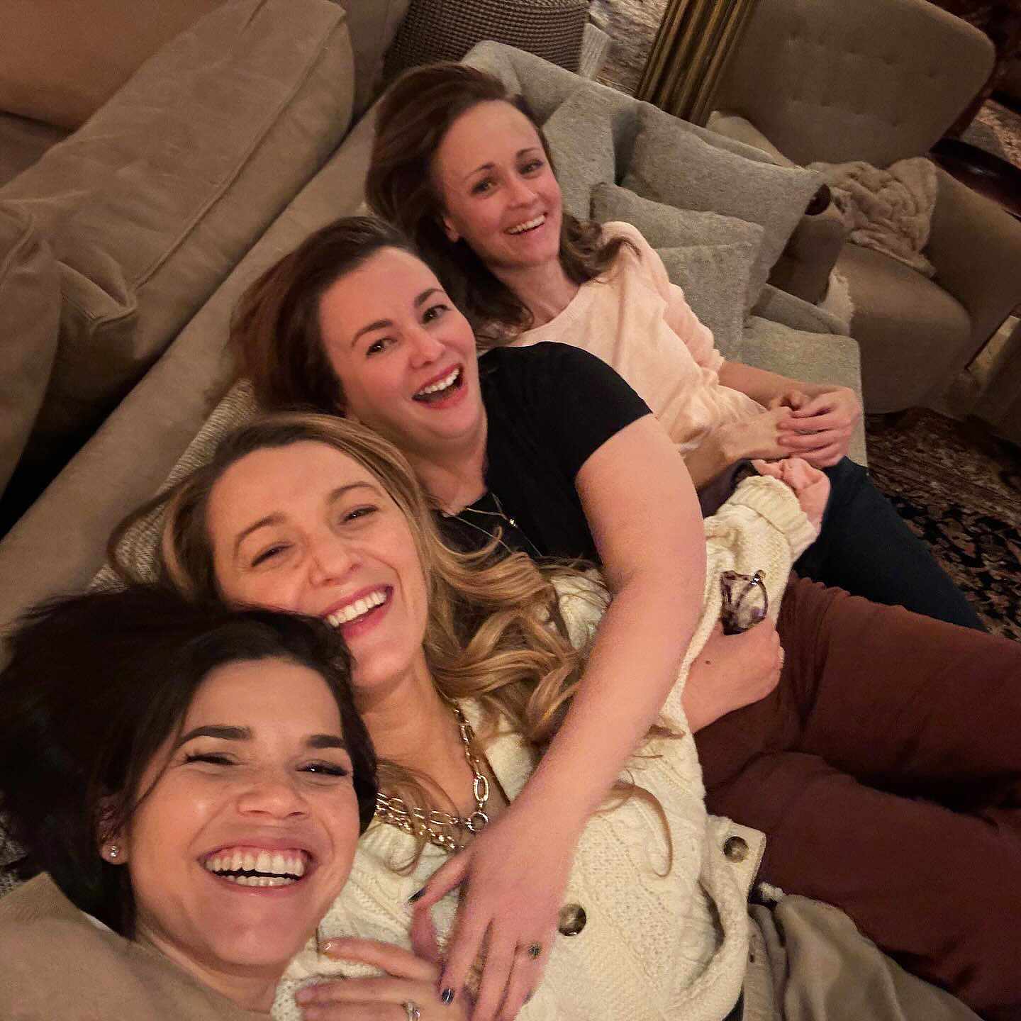 From left to right: America Ferrera, Blake Lively, Amber Tamblyn and Alexis Bledel pose for a couch selfie in 2023