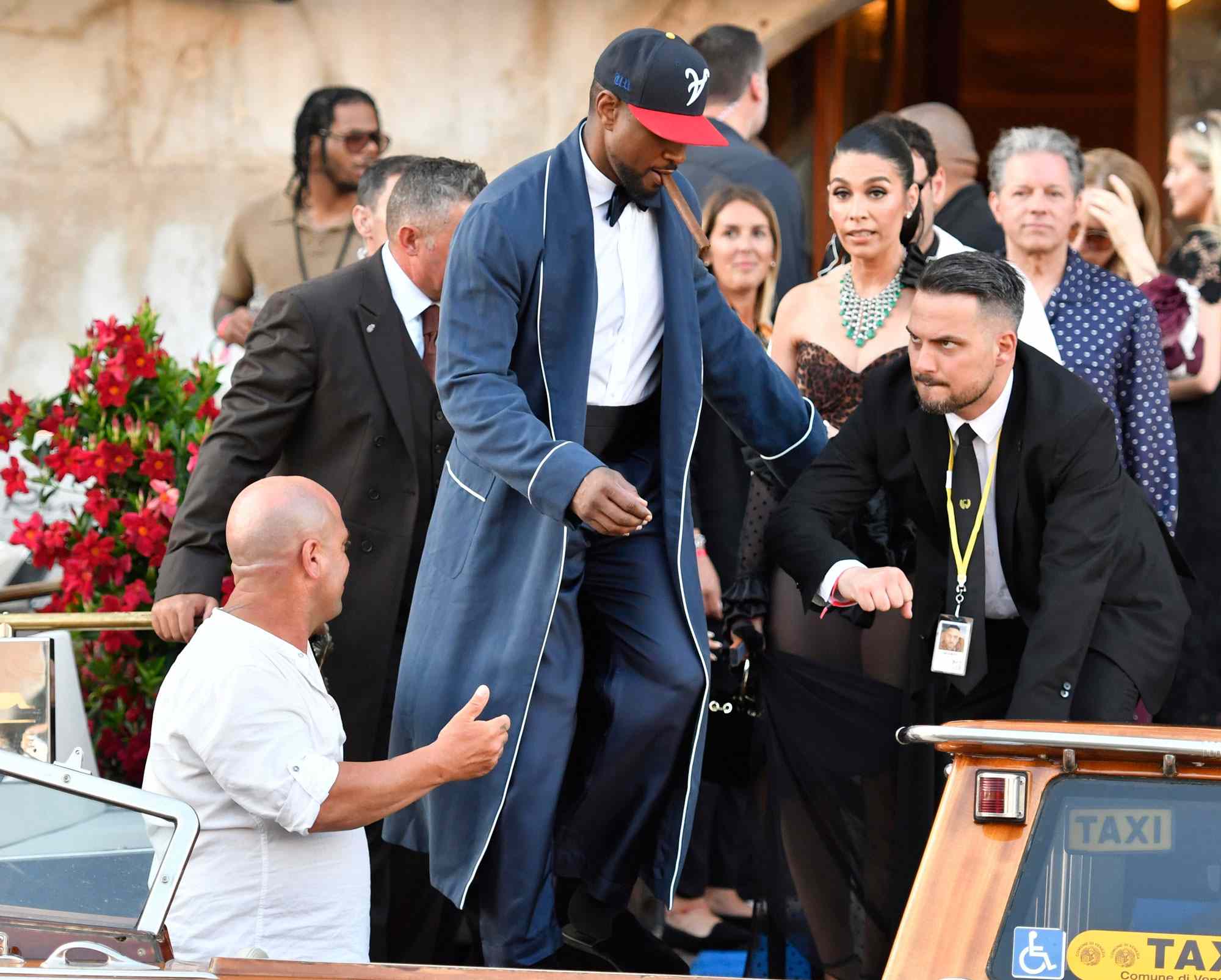 Usher leaves a hotel during celebrations for Jeff Bezos and Lauren Sanchez Bezos' wedding, in Venice, Saturday, June 28, 2025