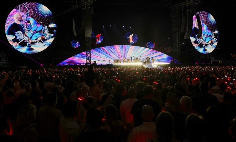 LAS VEGAS, NEVADA - JUNE 06: (L-R) Jonny Buckland, Will Champion, Chris Martin and Guy Berryman of Coldplay perform on a stop of the band