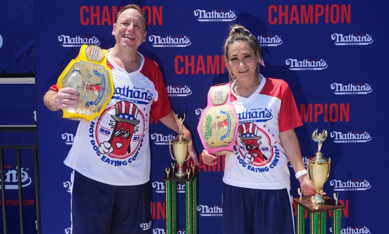 NEW YORK, NEW YORK - JULY 4: Winners Joey Chestnut and Miki Sudo at Nathan
