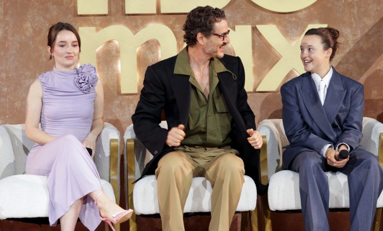 Kaitlyn Dever, Pedro Pascal and Bella Ramsey speak onstage during the HBO Max Emmy Nominee Celebration at Nya West on Aug. 17 in Hollywood.