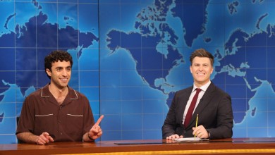 Emil Wakim (left) with anchor Colin Jost during Weekend Update on the April 12 episode.
