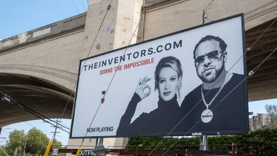 Those Elizabeth Holmes Billboards That Are Popping Up All Over Town? Meet the Mystery Man Behind Them
