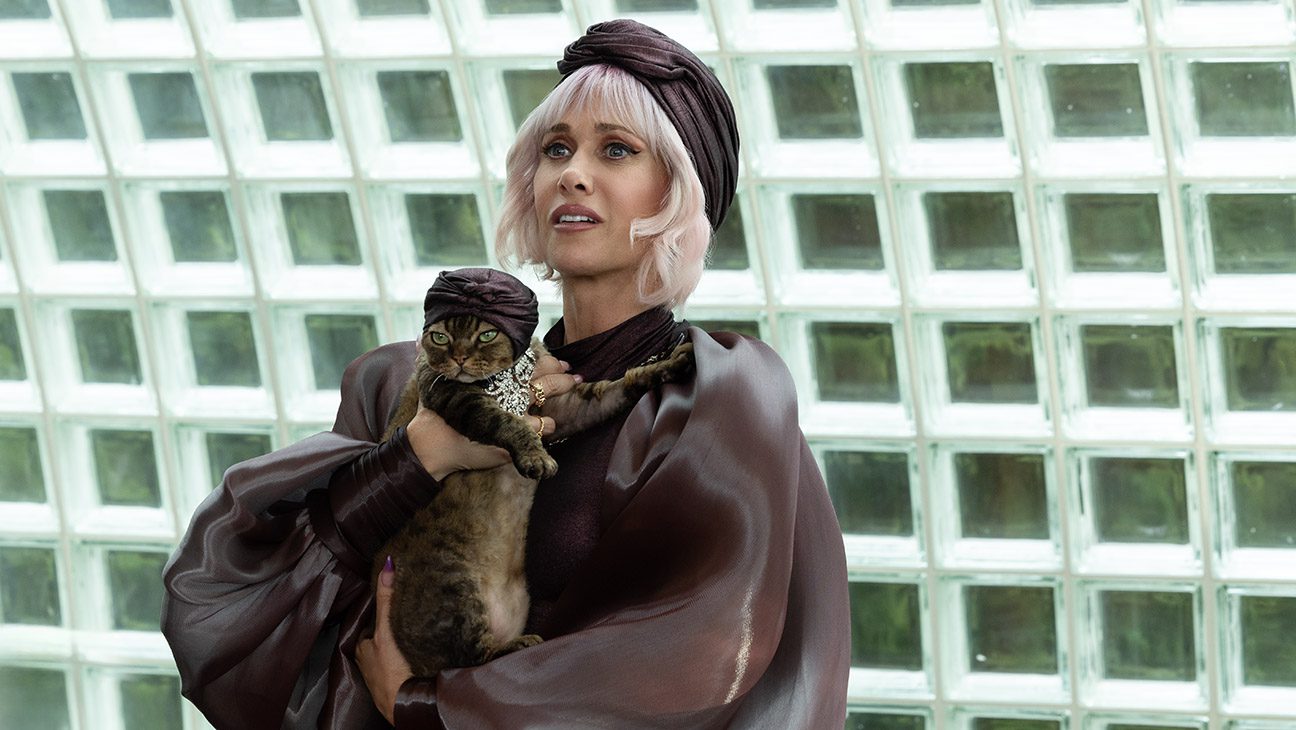 (from left) Marlene Purrkins (Jonesy The Cat) and Vera the Cat Lady (Kristen Wiig) in DreamWorks Animation’s Gabby’s Dollhouse: The Movie, directed by Ryan Crego.