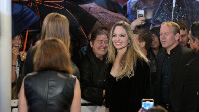 Angelina Jolie, Louis Garrel Brave Torrential Rain in San Sebastian for European Premiere of Alice Winocour’s ‘Couture’