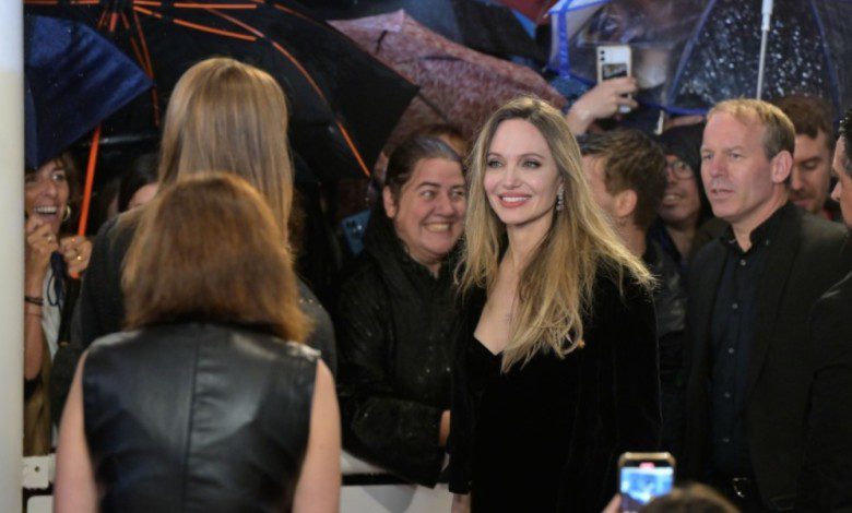 Angelina Jolie, Louis Garrel Brave Torrential Rain in San Sebastian for European Premiere of Alice Winocour’s ‘Couture’