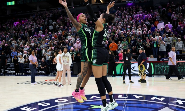 Courtney Williams #10 and Napheesa Collier #24 of the Minnesota Lynx celebrate a 72-53 win against the Golden State Valkyries at Target Center on September 11, 2025 in Minneapolis, Minnesota.