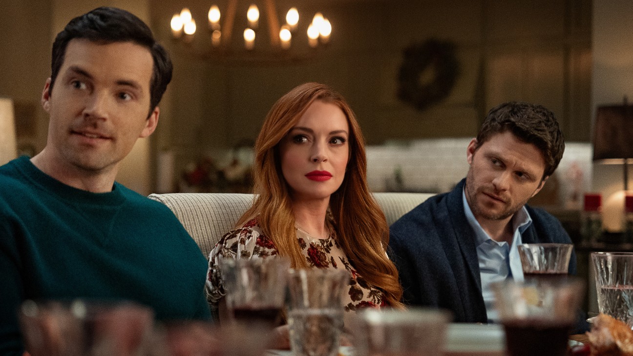 Ian Harding, Lindsay Lohan and Jon Rudnitsky in Netflix's 'Our Little Secret.'