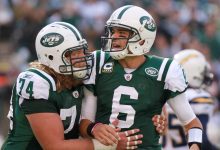EAST RUTHERFORD, NJ - OCTOBER 23: Mark Sanchez #6 of the New York Jets is congratulated on a touchdown pass by teammate Nick Mangold #74 against the San Diego Chargers at MetLife Stadium on October 23, 2011 in East Rutherford, New Jersey. (Photo by Nick Laham/Getty Images)