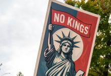 SHELBURNE, VERMONT - OCTOBER 18: Protestors march in the second No Kings protest on October 18, 2025 in Shelburne, Vermont. Organizers expect millions to participate in cities and towns across the nation for the second