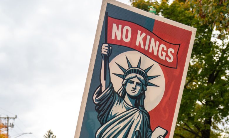 SHELBURNE, VERMONT - OCTOBER 18: Protestors march in the second No Kings protest on October 18, 2025 in Shelburne, Vermont. Organizers expect millions to participate in cities and towns across the nation for the second