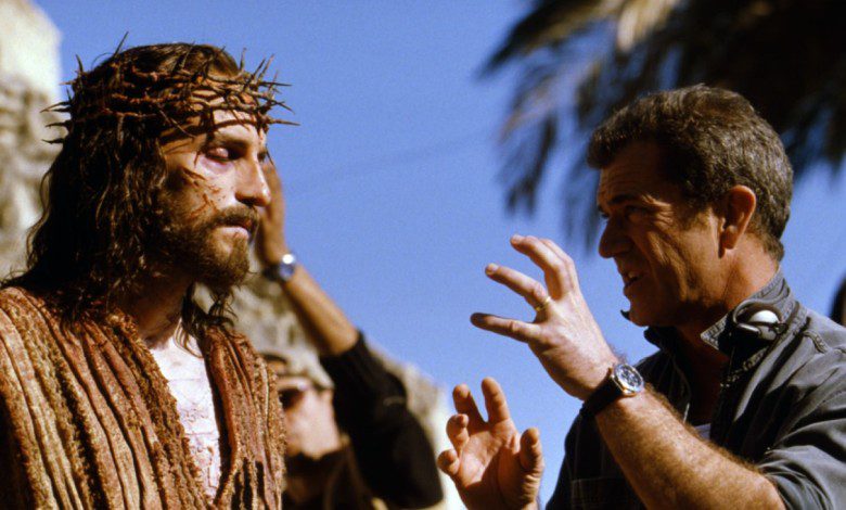Jim Caviezel and Mel Gibson on the set of