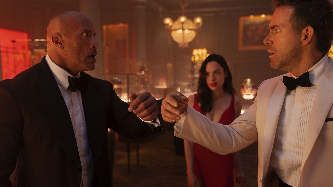 Dwayne Johnson Gal Gadot and Ryan Reynolds in RED NOTICE.