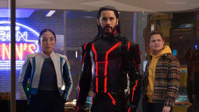 (L-R) Greta Lee as Eve Kim, Jared Leto as Ares, and Arturo Castro as Seth Flores in Tron: Ares