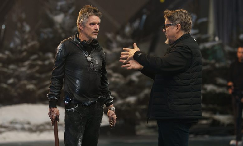 (from left) Ethan Hawke and director Scott Derrickson on the set of Black Phone 2.