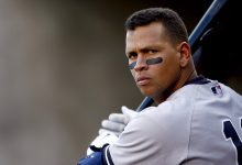 Alex Rodriguez 13 of the New York Yankees warms up in the dugout in a game against the Detroit Tigers during Game Four of the 2006 American League Division Series on October 7, 2006 at Comerica Park in Detroit, Michigan.